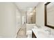 Bright bathroom featuring a glass-enclosed shower and modern vanity at 423 Bent Tree Ln, Indianapolis, IN 46260