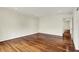 Spacious bedroom with hardwood floors and natural light streaming in, featuring doorways to other rooms at 423 Bent Tree Ln, Indianapolis, IN 46260