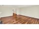 Spacious living room featuring hardwood floors and open access to the rest of the home at 423 Bent Tree Ln, Indianapolis, IN 46260