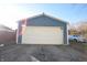 A well-kept two car garage with an automatic door in a residential neighborhood at 4231 Carrollton Ave, Indianapolis, IN 46205