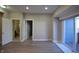 Main bedroom features a sliding door to deck and an open door to bathroom at 4231 Carrollton Ave, Indianapolis, IN 46205