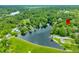 Gorgeous aerial view of the lake and surrounding neighborhood at 429 E Hoover Dr, Nineveh, IN 46164