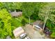 Aerial view of a private estate with a house, garage, pond, and lush landscaping at 429 E Hoover Dr, Nineveh, IN 46164