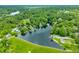 Scenic aerial view of lake with lush greenery, houses along the shoreline at 429 E Hoover Dr, Nineveh, IN 46164