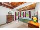 Bright bedroom with a wood ceiling, large windows, and comfortable furnishings at 429 E Hoover Dr, Nineveh, IN 46164