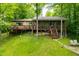 Inviting lake house with a spacious deck, perfect for enjoying the serene views and natural beauty at 429 E Hoover Dr, Nineveh, IN 46164