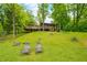 Exterior shot of cabin featuring outdoor seating and scenic hillside views at 429 E Hoover Dr, Nineveh, IN 46164