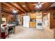 Spacious kitchen with wood accents, modern appliances, and a dining area is perfect for gatherings at 429 E Hoover Dr, Nineveh, IN 46164