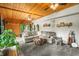 Spacious living room with wood ceiling and a view to the backyard at 429 E Hoover Dr, Nineveh, IN 46164