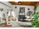 Charming living room with a fireplace, comfortable seating, and unique decor offers a cozy ambiance at 429 E Hoover Dr, Nineveh, IN 46164
