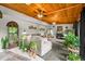 Bright, open living room with fireplace and access to the outdoor deck at 429 E Hoover Dr, Nineveh, IN 46164