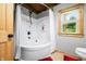 Bright shower featuring white tile, and a window at 429 E Hoover Dr, Nineveh, IN 46164