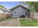Backyard featuring a well maintained fenced-in yard and gray siding at 441 N Temple Ave, Indianapolis, IN 46201