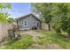 Backyard featuring a well maintained fenced-in yard and gray siding at 441 N Temple Ave, Indianapolis, IN 46201