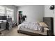 Cozy bedroom has a closet, plush carpet, and great natural light at 441 N Temple Ave, Indianapolis, IN 46201