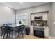 Eat-in kitchen features stainless steel appliances, granite countertops, and plenty of natural light at 441 N Temple Ave, Indianapolis, IN 46201