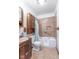 Compact bathroom featuring tile flooring, walk in bathtub and showerhead at 4526 Iowa St, Clayton, IN 46118