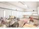 Bright garage interior with various equipment and tools, ready for projects and storage at 4526 Iowa St, Clayton, IN 46118