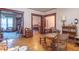 Bright living room with hardwood floors and vintage furnishings at 4526 Iowa St, Clayton, IN 46118