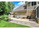 Home's backyard with a patio area ideal for outdoor dining and entertaining at 4623 E Windsor Ln, Columbus, IN 47201