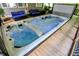 An outdoor hot tub with a wood deck offering therapeutic spa experience and a relaxing place to unwind at 4623 E Windsor Ln, Columbus, IN 47201