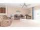 Cozy living room with comfortable seating and neutral decor, perfect for relaxing and entertaining guests at 485 Thunderwood Dr, Greenfield, IN 46140
