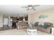 Open concept living room seamlessly connects to the kitchen, offering a great space for gatherings at 485 Thunderwood Dr, Greenfield, IN 46140