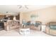 Comfortable living room with plush couches and a view into the kitchen at 485 Thunderwood Dr, Greenfield, IN 46140