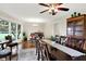 Dining room boasting hardwood floors, a large table, and plenty of natural light at 4990 E County Road 750 S, Brownsburg, IN 46112