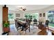 Formal dining room featuring a large table, ornate chairs, and natural lighting at 4990 E County Road 750 S, Brownsburg, IN 46112