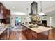 Open kitchen featuring granite countertops, modern appliances, and cherry wood cabinets at 4990 E County Road 750 S, Brownsburg, IN 46112