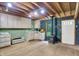 Unfinished living room with an exposed wood beam ceiling and rustic wood burning stove at 4990 E County Road 750 S, Brownsburg, IN 46112