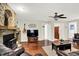 Comfortable living room with fireplace and media center at 4990 E County Road 750 S, Brownsburg, IN 46112