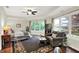 Spacious main bedroom featuring sitting area, tray ceiling, and large windows at 4990 E County Road 750 S, Brownsburg, IN 46112