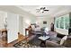 Spacious main bedroom with sitting area, tray ceilings and dark wood flooring at 4990 E County Road 750 S, Brownsburg, IN 46112
