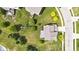 An aerial shot of a property with a spacious backyard, mature trees, and a neighborhood setting at 515 Lynton Way, Westfield, IN 46074