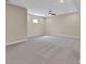 Finished basement space with neutral carpeting, recessed lighting, and a ceiling fan at 515 Lynton Way, Westfield, IN 46074