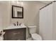A bathroom with modern fixtures, a stylish vanity, and a shower with a white shower curtain at 515 Lynton Way, Westfield, IN 46074