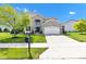 Beautiful two-story home boasts a manicured lawn, stylish brickwork, and an attached two-car garage at 515 Lynton Way, Westfield, IN 46074