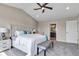 Tranquil main bedroom featuring vaulted ceilings, carpet, and an ensuite bathroom at 515 Lynton Way, Westfield, IN 46074