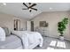 Spacious main bedroom features a view of ensuite bathroom, vaulted ceilings, neutral colors, and cozy decor at 515 Lynton Way, Westfield, IN 46074