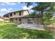 Spacious backyard featuring a brick patio, well-maintained lawn, and mature trees at 5325 Ridge Hill Way, Avon, IN 46123