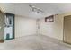 Unfinished basement area with concrete floors, drop ceiling, and electrical panel at 5325 Ridge Hill Way, Avon, IN 46123