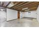 Unfinished basement area featuring concrete floors, exposed ceiling, and a single window at 5325 Ridge Hill Way, Avon, IN 46123