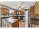 Well-equipped kitchen with wood cabinets, stainless steel appliances, and plenty of counter space at 5325 Ridge Hill Way, Avon, IN 46123