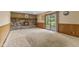 Spacious living room featuring a cozy brick fireplace and sliding glass doors to the outside at 5325 Ridge Hill Way, Avon, IN 46123