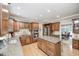 Spacious kitchen with wood cabinets, stainless steel appliances, and an island at 5404 Cayman Dr, Carmel, IN 46033