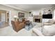 Cozy living room featuring a fireplace, built-in shelves, comfortable seating, and stylish decor for relaxation at 5404 Cayman Dr, Carmel, IN 46033
