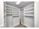 Spacious walk-in closet with ample shelving and hanging space for organized storage at 5404 Cayman Dr, Carmel, IN 46033
