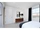 Modern bedroom featuring sleek furniture, neutral walls, and bright window at 569 Dalton Way, Avon, IN 46123